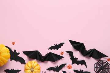 Sticker - Paper bats with spider web and fresh pumpkins for Halloween party on pink background