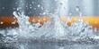 © Vibrant Visions Pixe - A Close-Up of Water Droplets Creating a Dramatic Splash with an Orange Blurred Background