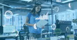 © vectorfusionart - Analyzing data charts and graphs, businesswoman in office with digital image