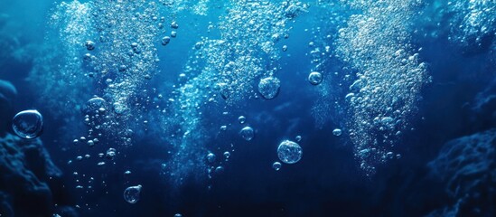 Bubbles Rising in Deep Blue Water