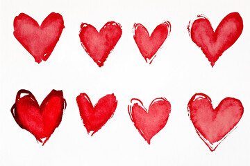 outlines of hearts drawn with watercolor red paint on a white isolated background