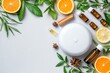 © Thanyarat - A flat lay of essential oils and a diffuser, set up for aromatherapy to enhance relaxation and wellness