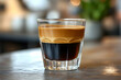 © Neural9 Project - Close-Up Shot of a Layered Coffee Drink in a Glass on a Table