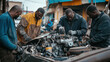 © Curioposs - Mechanics Working on a Car Engine
