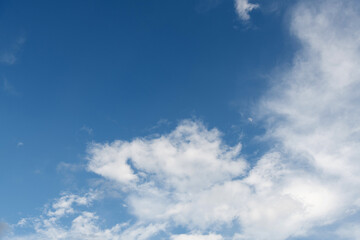Wall Mural - wispy clouds in the blue sky