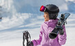 © Maridav - Skiing woman portrait. Skier woman athlete going skiing on slope ski piste wearing helmet and ski goggles in winter nature landscape. Winter sports active lifestyle