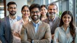 © N7 - A portrait of an Indian multicultural team of professionals working together in an office.