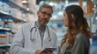 © SS Digital - Young pharmaceutic seller explaining something to doctor in hospital