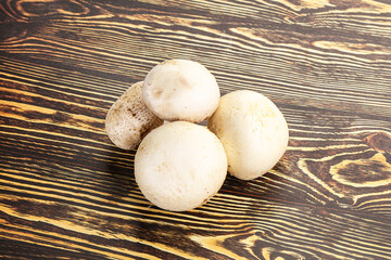 Natural organic ripe champignon mushrooms