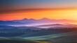 © rehan - Rolling Hills and Mountain Peaks at Sunrise