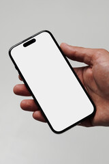 Realistic mockup of a smartphone in hand on a gray background, close-up photo, smartphone in hand