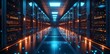 © nurionstudio - Empty server room hallway with blue and orange lighting and a glowing floor.