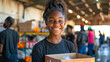 © ximich_natali - Smiling black girl, volunteer at food bank at community warehouse, volunteer center