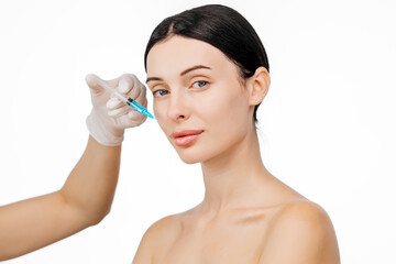 A beautiful young woman with a serene expression, as a gloved hand holds a syringe. This moment captures the essence of cosmetology and plastic surgery, highlighting the pursuit of beauty and self-car