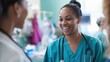 © Attasit - A nurse greeting a patient in a brightly lit clinic room, medical instruments in the background.
