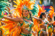 © MVProductions - Brazilian carnival. Beautiful Dancers in outfit with feathers and wings enjoying the parade, smile to crowd