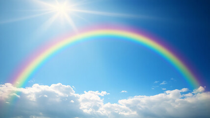 Beautiful rainbow in the blue sky with clouds