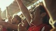 © VK Studio - Fans in a stadium bask in the golden sunlight, raising their arms and shouting with joy, their faces glowing with excitement and camaraderie.