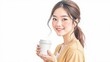 © Olga - Asian woman standing with paper cup for takeaway coffee drinks or tea on white background. Place for text