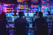 © PHAISITSAWAN - A Hitech office with programmers sitting near a table with laptops.
