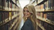 © rehan - Blonde Woman Smiling in a Library Aisle