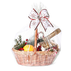 Poster - Wicker gift basket with sparkling wine and Christmas decor isolated on white