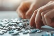 © Emma - Close-up of hands solving a puzzle, symbolic of strategy and collaboration, teamwork puzzle, problem-solving metaphor