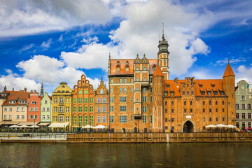 Beautiful city of Gdansk in the margins of the Motlawa river with the touristic boats and coloured buildings