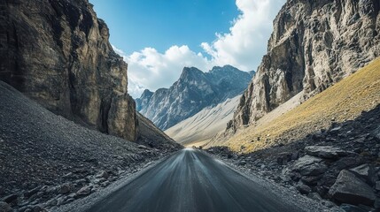 Wall Mural - Mountain pass road with towering peaks on both sides, Rugged journey exploration