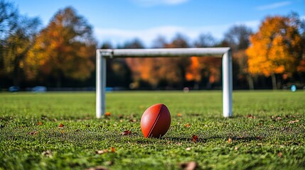 Wall Mural - A wide-angle shot of a field goal attempt during a tense moment in the game with the football soaring towards the posts Large space for text in center Stock Photo with copy space