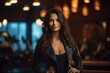 © Markus Schröder - Portrait of a blissful woman in her 30s sporting a stylish leather blazer isolated in dynamic fitness gym background