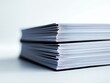 © robfolio - Stack of Colorful Magazines on White Background