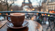 © Danielle - A cup of hot chocolate with blurred Paris in the background