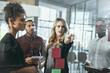 © BestCam/peopleimages.com - Sticky notes, glass and woman with ideas, office and collaboration of people for stock market. Brainstorming, financial advisor and discussion of group, tablet and planning for investment opportunity
