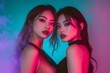 © BCFC - A vibrant night club image showcasing two beautiful Asian women dancing and posing glamorously together on the dance floor, illuminated by striking neon lights in a lively club atmosphere.