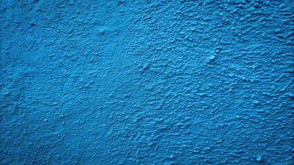 Blue concrete wall with rough textured surface perfect for urban background photoshoot