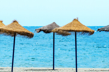 Wall Mural - Beach umbrellas are on the beach