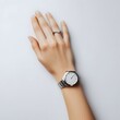 © Cibric - a woman's hand with a watch on her hand