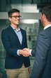 © CamPen2000/peopleimages.com - Smile, business people or handshake to welcome to office, introduction or greeting. Shaking hands, deal and team in agreement for collaboration, b2b partnership or negotiation success with pr officer
