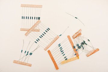 Electronic components. Film resistors on a white background.