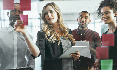 Poster - Sticky notes, glass and woman with tablet, office and collaboration of people or stock market. Brainstorming, financial advisor and discussion of group, reading or planning for investment opportunity