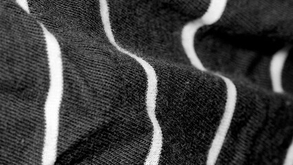 Texture of black fabric with white stripes