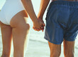 © StarDweller/peopleimages.com - Beach, holding hands and back of couple, outdoor and romance in holiday, water and bonding in nature. Love, travel and people at sea, fresh air and vacation in summer, waves and together on date