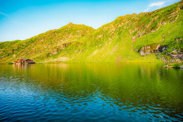 Fagaras mountains with Balea lake on Transfagarasan serpentine road in Sibiu County, Romania.