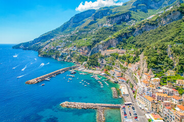 Amalfi on Amalfi Coast, Italy. Aerial photo of famous city Amalfi located on Amalfi Coast with blue sea water and beautiful colorful houses on the cliff