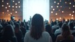 © Rick Cranches - A girl stands in front of the stage where world leaders are speaking, a girl asks a question to inspire the audience, Leadership, Conference, blurred background