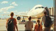 © Rick Cranches - The family is waiting to board a flight in the airport transit lounge and looking out the window at a large plane.