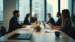 © yahya - Blurred Office Meeting with Collaborative Work Setting