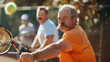 © spyrakot - Men Playing Doubles Tennis with Movember Mustaches on a Sunny Day Promoting Fitness and Health
