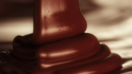 Poster - Super Slow Motion of Pouring Hot Melted Chocolate, Filmed on High Speed Cinema Camera, 1000 fps. Extreme Macro Shot.
